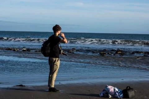 Man Standing On Beach Stock Photos
