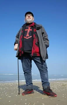 Man standing on the beach Stock Photos