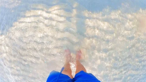 Man standing on the beach in Slow motion Stock Footage 112105101