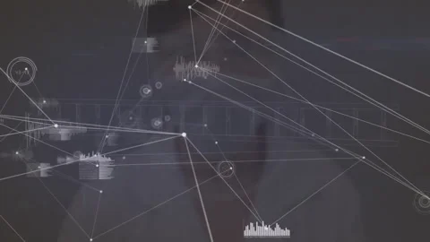 Man standing behind digital network tapping node displaying 52 스톡 동영상 312415890