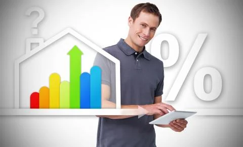 Man standing behind the energy efficient house graphic Stock Photos