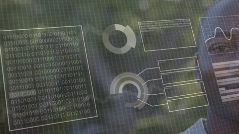 Man standing behind HUD while bar chart appearing, binary staying, donuts Stock Footage 332902117
