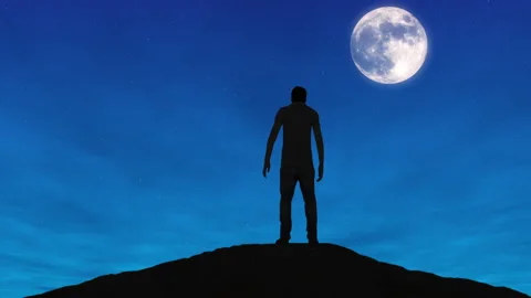 A man standing at a cliff edge contemplating jumping to commit suicide. Stock Footage 135588518