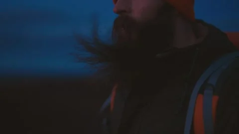 Man Standing on Cliff Overlooking Vast Icelandic Landscape Видео 307422081