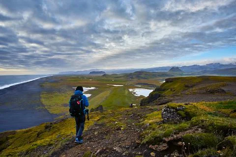 A man standing on the cliff Stock Photos