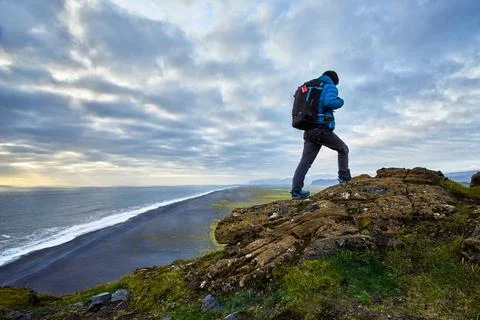 A man standing on the cliff Stock Photos