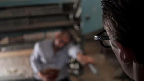 Man standing close to wounded man close-up Stock Footage 71540447