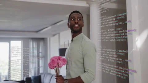 Man standing by columns holding pink bouquet, code text appearing, causing Stock Footage 333594515