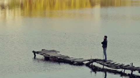 Man Standing on a Dock Video stock 24821217