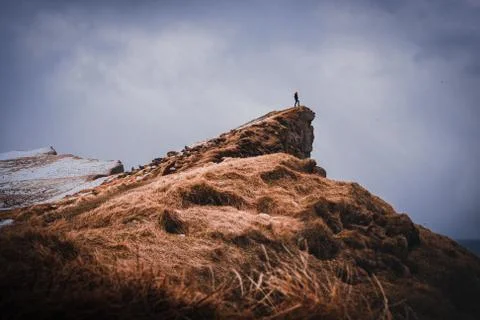 Man standing on the edge Stock Photos