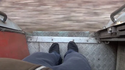 Man standing on the edge of the train Stock Footage 72332296