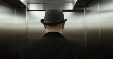 Man standing in elevator Stock Footage 86512136
