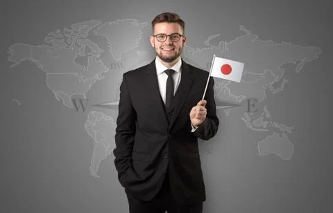 Man standing with flag and map background Stock Photos