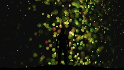 The man standing on a flying shimmering particles background Stock-Footage 165280755