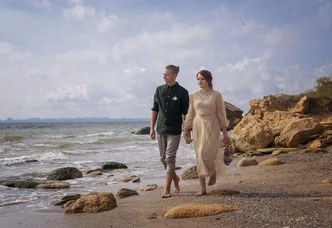 A man standing in front of a beach Stock Photos