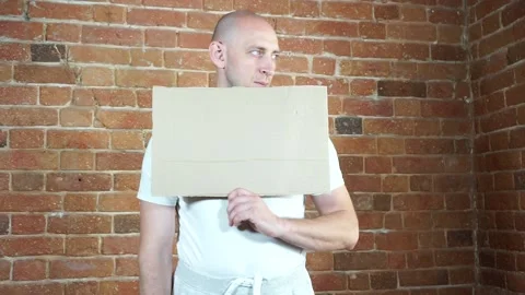 A man standing in front of a brick wall Video stock 134796601