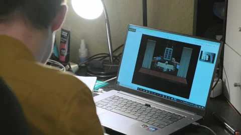 A man standing in front of a computer. Video conferencing. Stock Footage 151787514