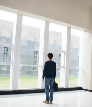 Man standing in the hall Stock Photos