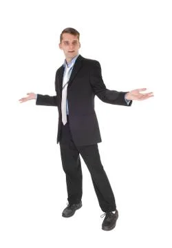 A man standing with hands outstretched is perplex Stock Photos