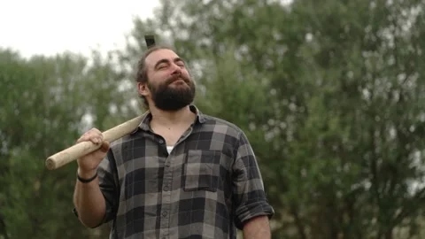 Man standing with hoe looking up Video stock 171432051