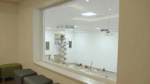 Man standing on lift Stock Footage 238859702