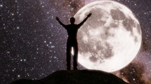 Man standing on mountain in front the of the starry sky and full moon Stock Footage 284542065