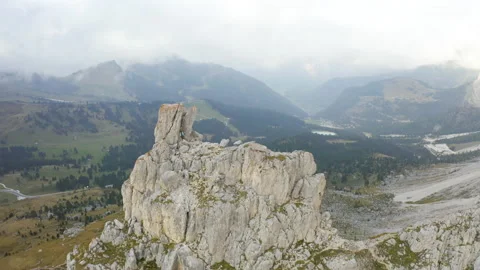 Man standing on mountain ridge epic drone view dolomites Stock Footage 143374081