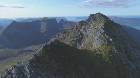 Man standing on mountain top Stock Footage 79659296