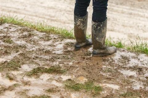 Man standing in mud Stock Photos