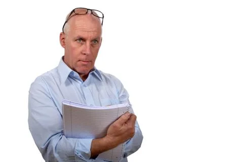 Man standing with a notebook Stock Photos