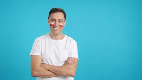 Man standing with polish flag painted on face smiling Video stock 270423700