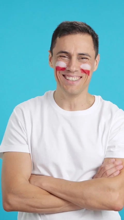 Man standing with polish flag painted on face smiling Stock Footage 271180783