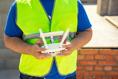 Man standing with quadcopter drone remote control Stock Photos