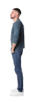 Man standing in queue on white background Stock Photos