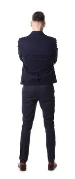 Man standing in queue on white background, back view Stock Photos