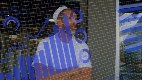 Man standing in retail window, data feed loading and animating charts across Stock Footage 333873541