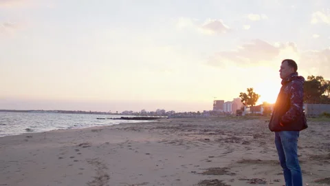 Man Standing by the Sea at Sunset, Copy Space Stock Footage 337211346