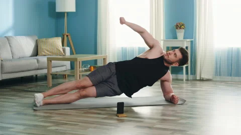 Man Is Standing In Side Elbow Plank Stock Footage 135536373