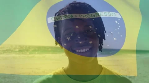 Man standing smiling at cam on beach overlay shifting at start animating flag Stock Footage 335762125