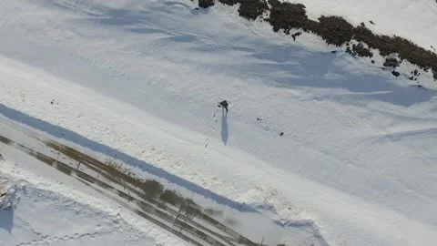 A man is standing in the snow Stock Footage 159515859