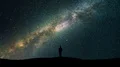 The man standing on the starry sky background. time lapse 4k or 4k+ Resolution