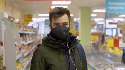 A man standing in the supermarket Stock Footage 126825825