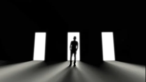 Man standing at three opening doors in darkness, light rays coming trough. Decis Stock Footage 151939531