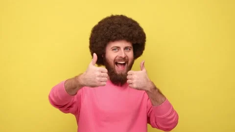 Man standing with thumbs up, like gesture, demonstrating approval and agree with Stock Footage 170715169