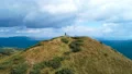 The man standing on the top of the mountain 4k or 4k+ Resolution