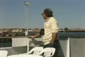 Man standing on tour boat Footage