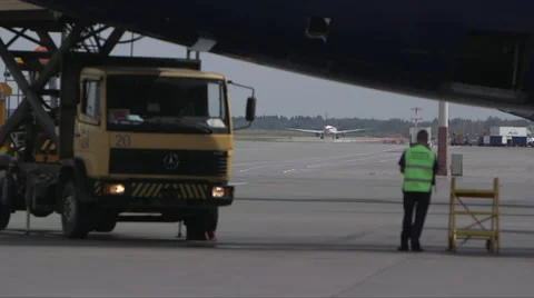 Man standing under airplane Stock Footage 41027002