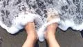 Man standing on a volcanic beach HD Footage