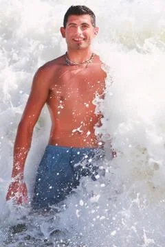 Man Standing In Waves 스톡 사진