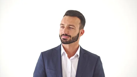 The man standing on the white wall background. slow motion Stock Footage 104536289